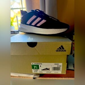 Brand new never worn Adidas sneakers. Size 7.5